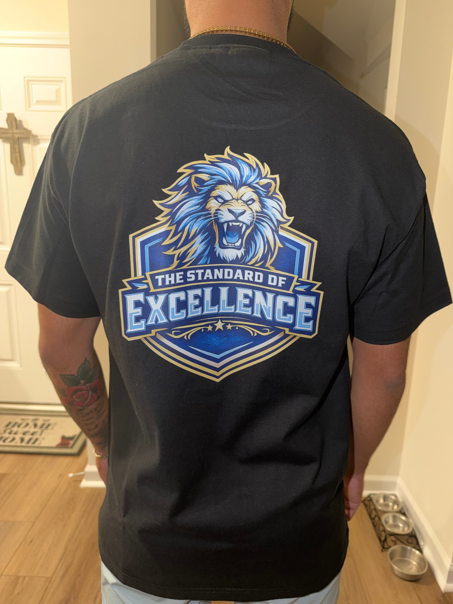 Custom 'Standard of Excellence' lion back print on black t-shirt